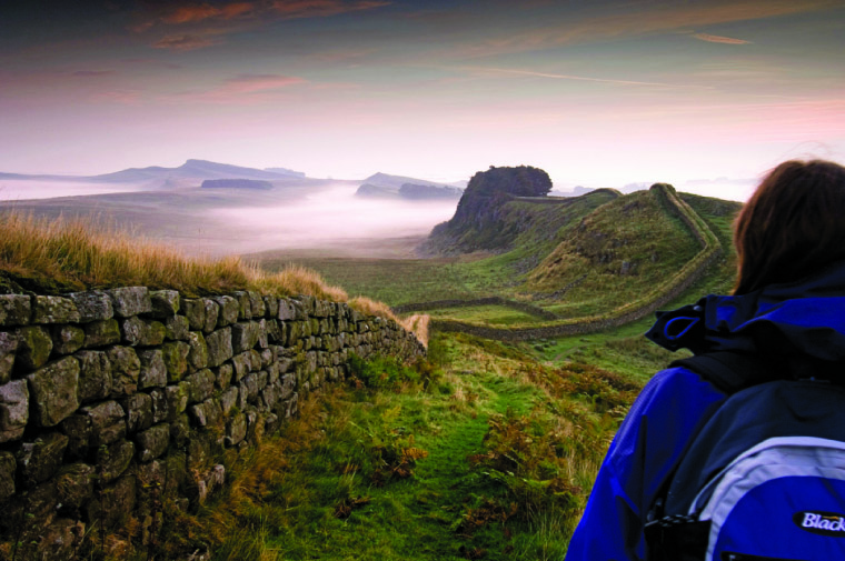 A view along Hadrian’s Wall towards sunrise near Housesteads Fort in Northumberland| Rod Edwards / British Tourist Authority