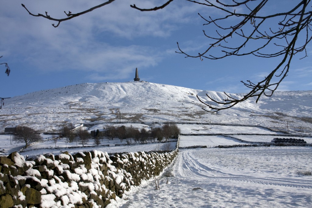 View to and from Stoodley Pike Monument in the snow West yorkshire