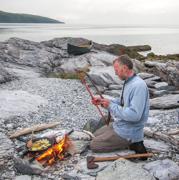 Using driftwood to cook in Arctic Norway. - tim gent