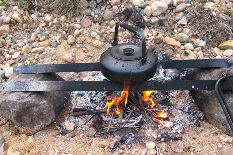 You really can cook using very small twigs and branches, and very small fires