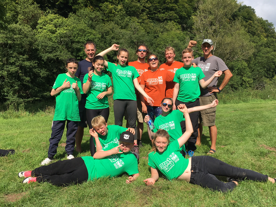 Mark Brigham (top left) of Ellis Brigham with a group of young people enjoying the Youth Adventure Trust’s six day Forest Camp