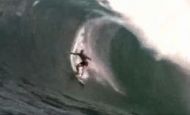 Laird Hamilton shredding some massive waves