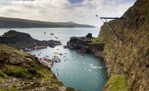 Anatoliy Shabotenko of the Ukraine dives from the 27.5 metre platform at the Blue Lagoon during the final round of the sixth stop of the Red Bull Cliff Diving World Series, Pembrokeshire, Wales, UK on September 8th 2012. // Romina Amato/Red Bull Content Pool // P-20120908-00185 // Usage for editorial use only // Please go to www.redbullcontentpool.com for further information. //